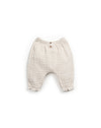 Woven pants with decorative buttons