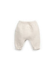 Woven pants with decorative buttons