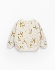 Jersey stitch sweater with slingshot print