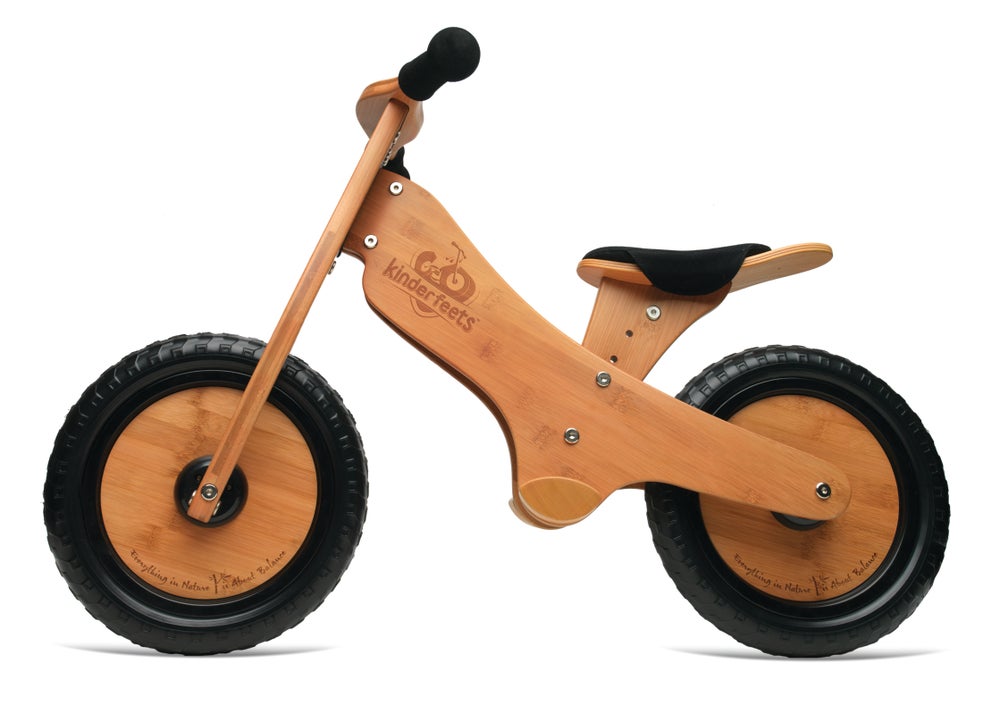 Balance bike with online foot pegs