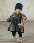 Plaid dress with embroidered collar in wool yarn