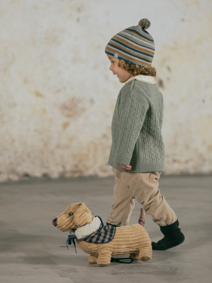 Beanie with pom-pom and embossed stripes