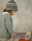 Beanie with pom-pom and embossed stripes