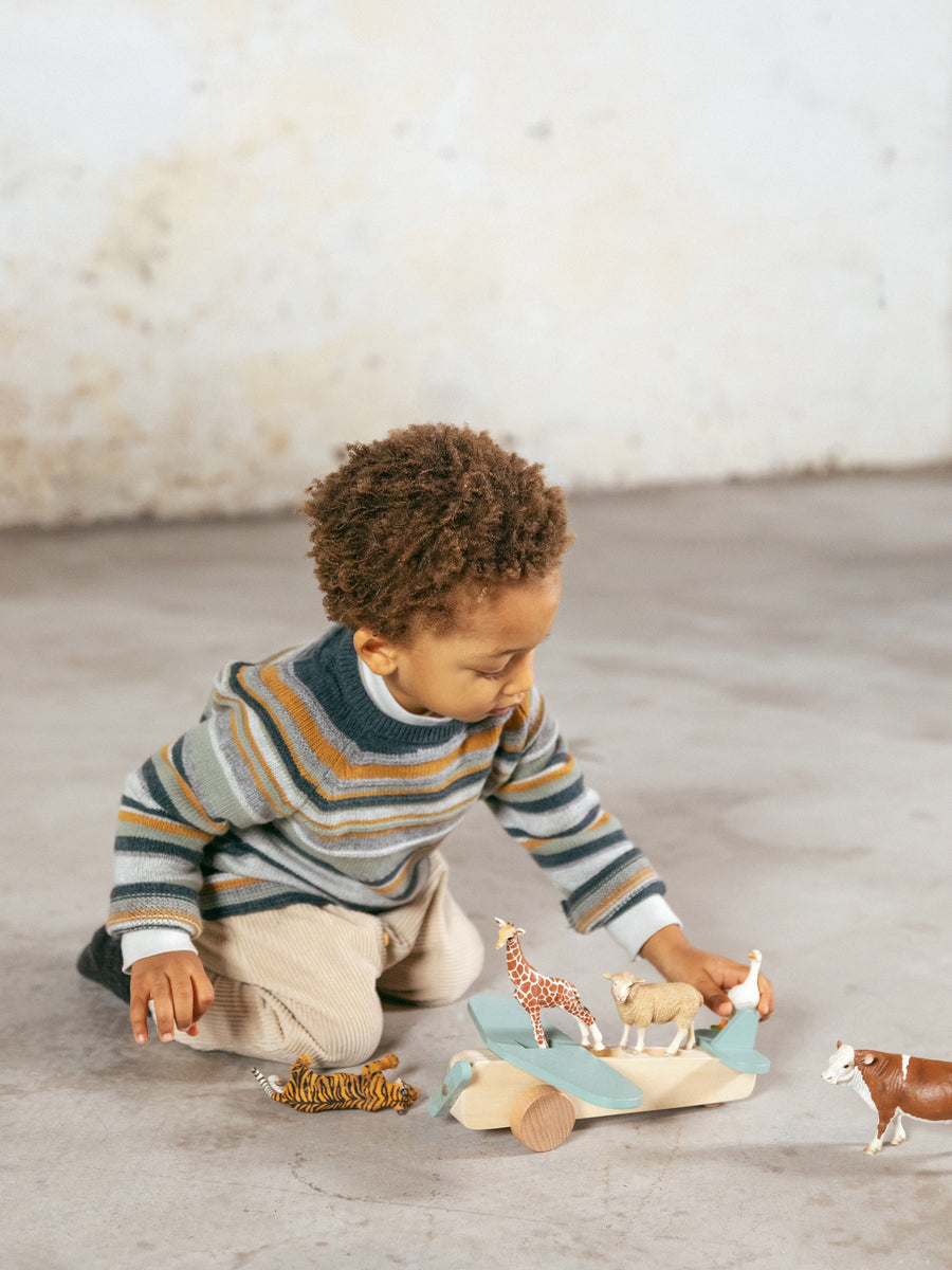 Knitted sweater with embossed stripes