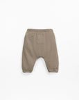 Woven trousers with decorative coconut button - Brown
