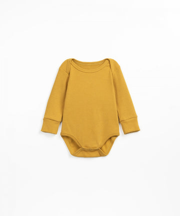 Ribbed bodysuit in organic cotton - Dijon