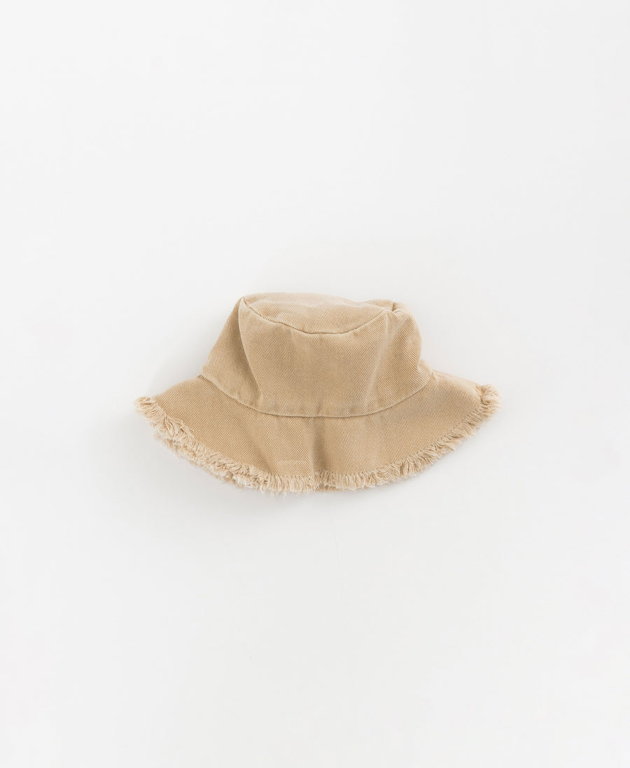 Hat with frayed detail on the brim